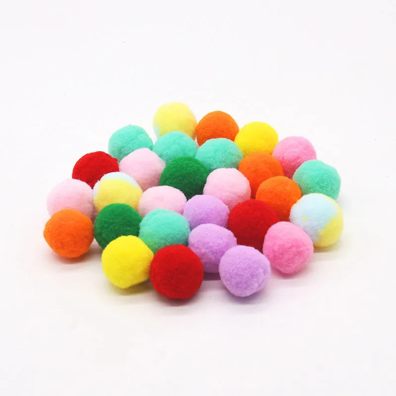 Pet toy launcher gun with soft plush balls for fetch games.