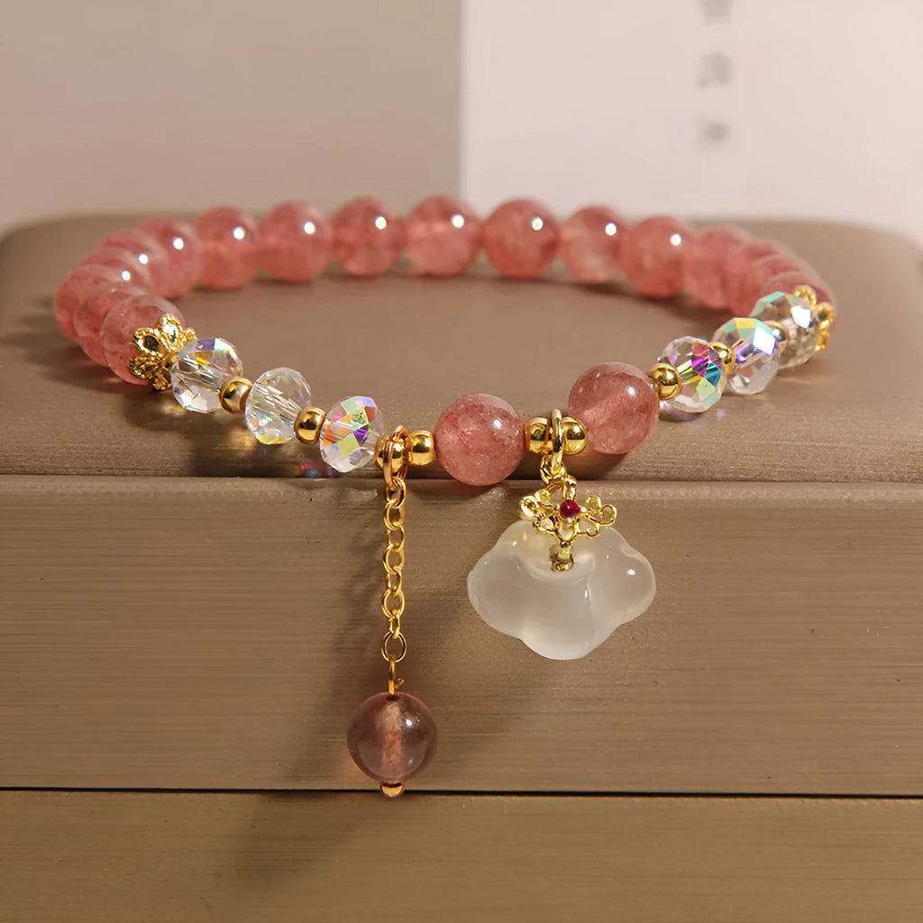 Women's natural bracelet with strawberry quartz, white agate beads, and auspicious cloud charms