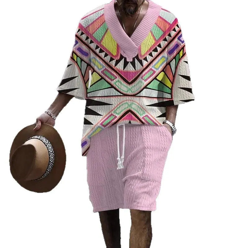 Man wearing a loose-fitting casual short sleeve suit with matching shorts in a solid colour.