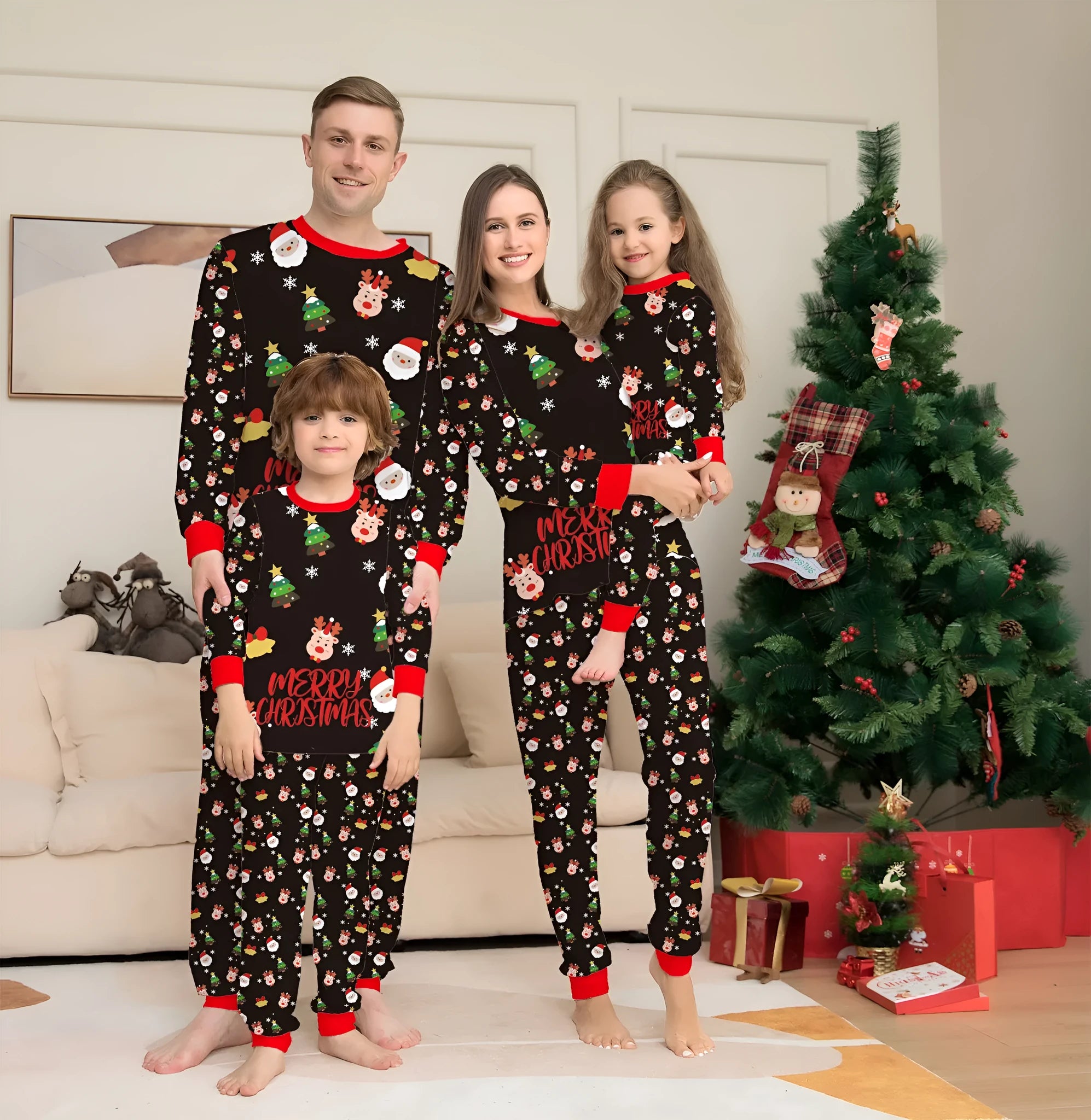 Family wearing matching red plaid Christmas pyjamas with dog in coordinating pyjamas