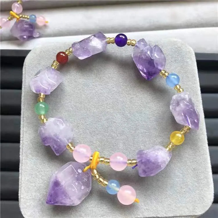 Natural shaped purple amethyst bead bracelet for women featuring a Fu character design element.