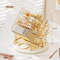 Rotating cosmetics storage box in Amber Gold colour on a vanity.