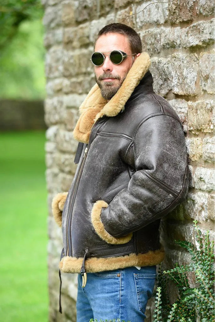 Men's brown synthetic leather fur coat with side pockets on a model