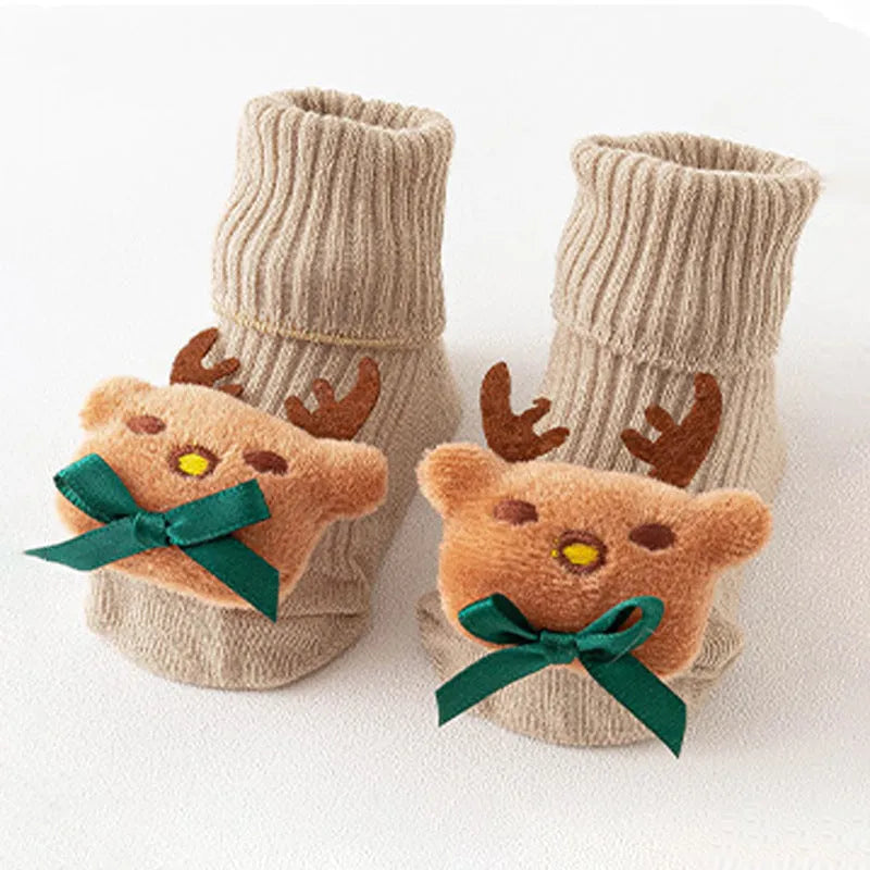 Cotton baby floor socks in various colours and patterns including bows, stars, and animal designs