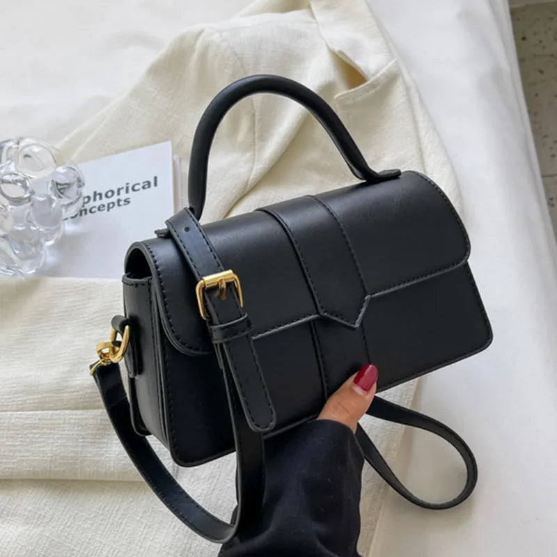 Women's beige PU messenger bag with sandwich pocket and file organiser interior.