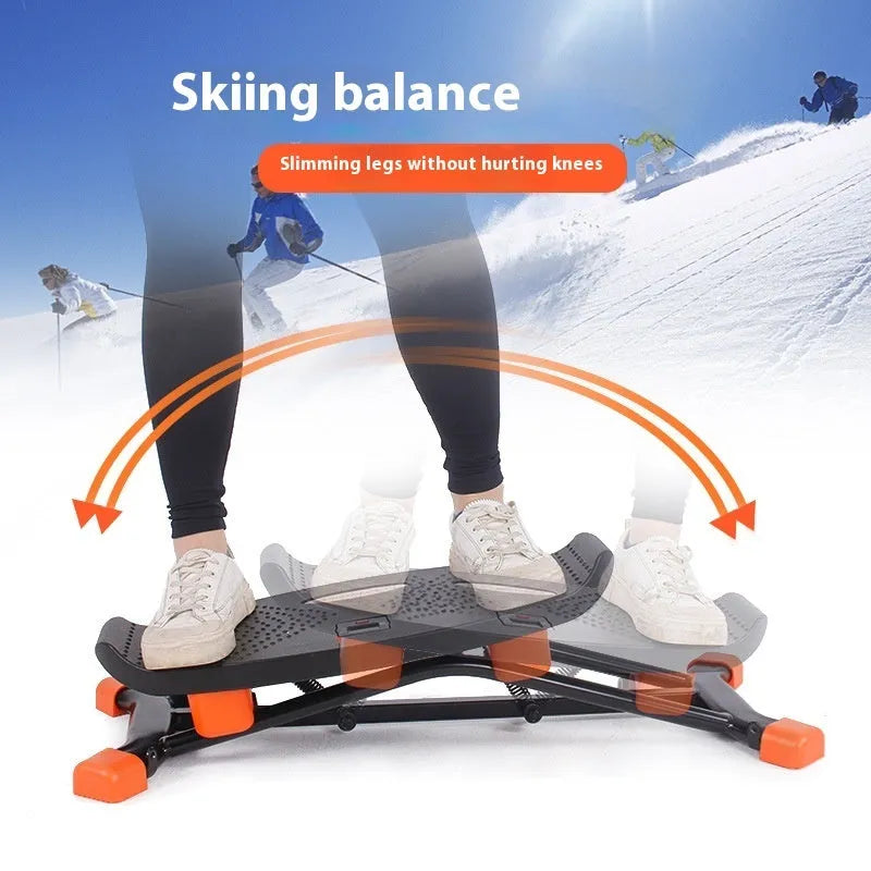 Black mini fitness skiing machine with elastic hand strap for home exercise.