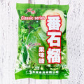 Assorted hard candies in plum, guava, and tangerine peel flavours in a bag.