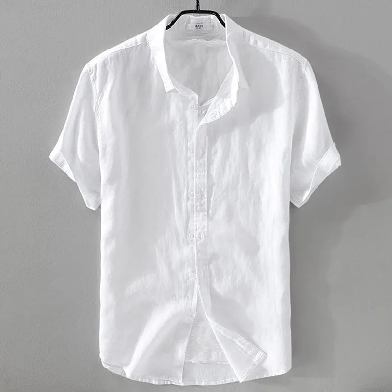 Man wearing a short sleeve apricot coloured loose-fit linen blend casual shirt.