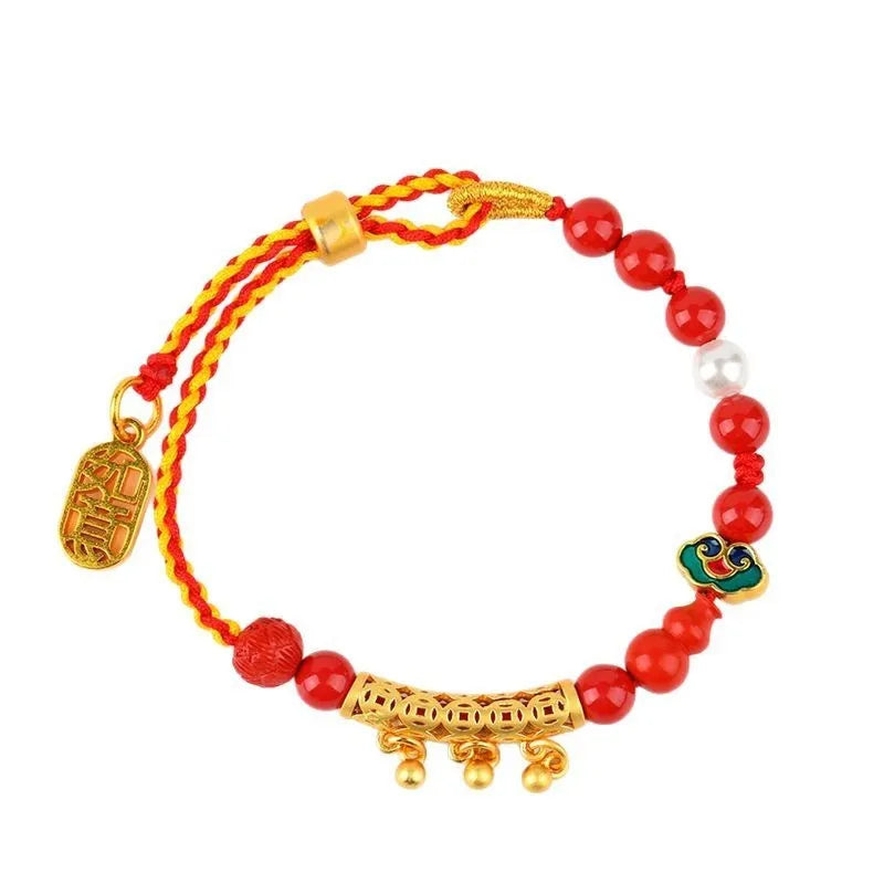 Women's hand-woven cinnabar red sand bell bracelet with round geometry design on neutral background