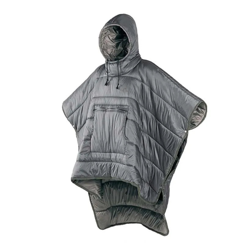 Outdoor cloak sleeping bag in grey laid out flat showing its 200x140cm rectangular shape.