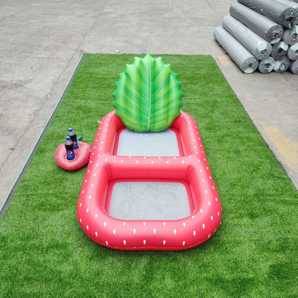 Inflatable pineapple pool lounger with cup holder floating on water in yellow colour