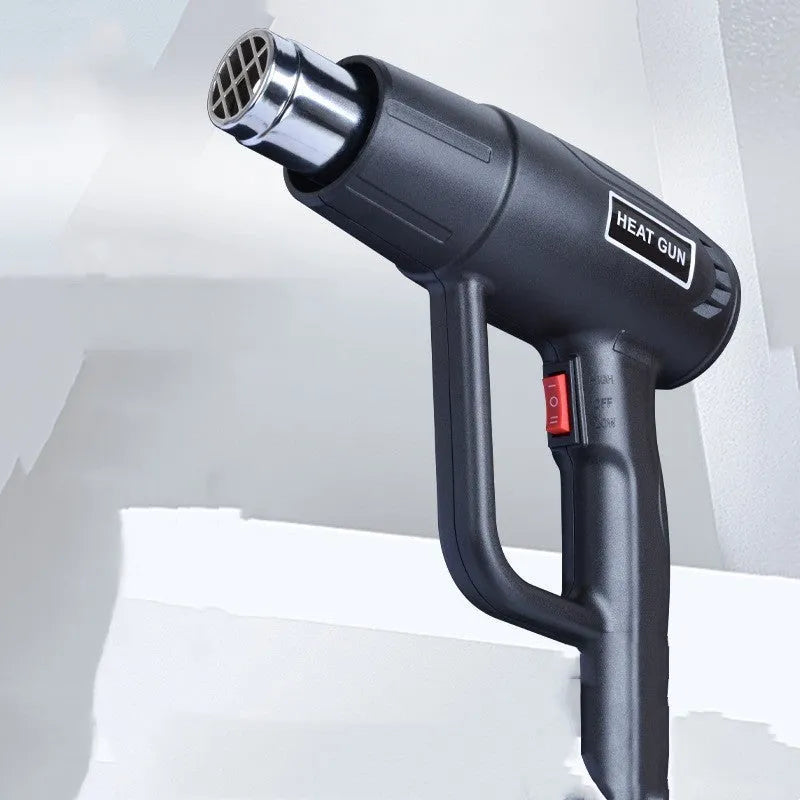 2000W industrial hot air gun with anti-slip thermal insulation shell and grid air outlet.