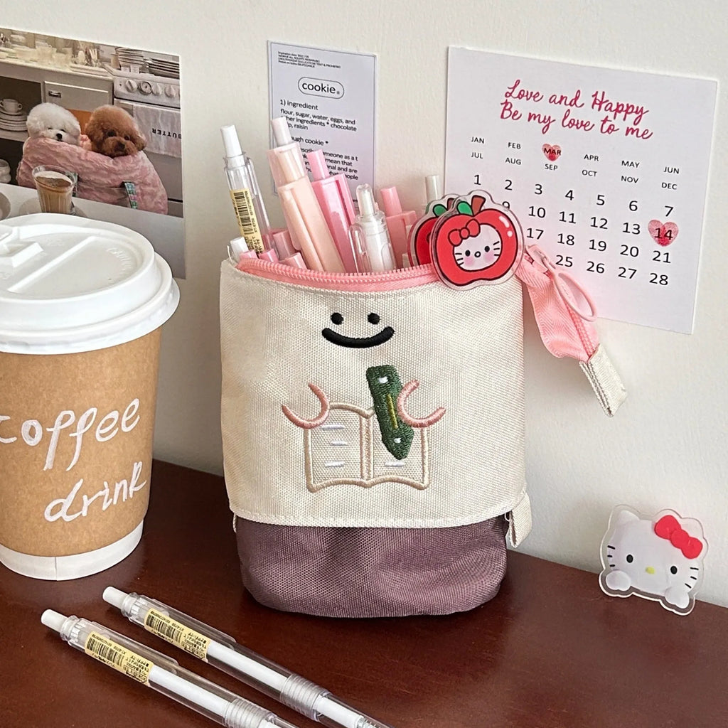 Brown Korean-style cartoon collapsible pencil case made from Oxford fabric, shown open and closed.