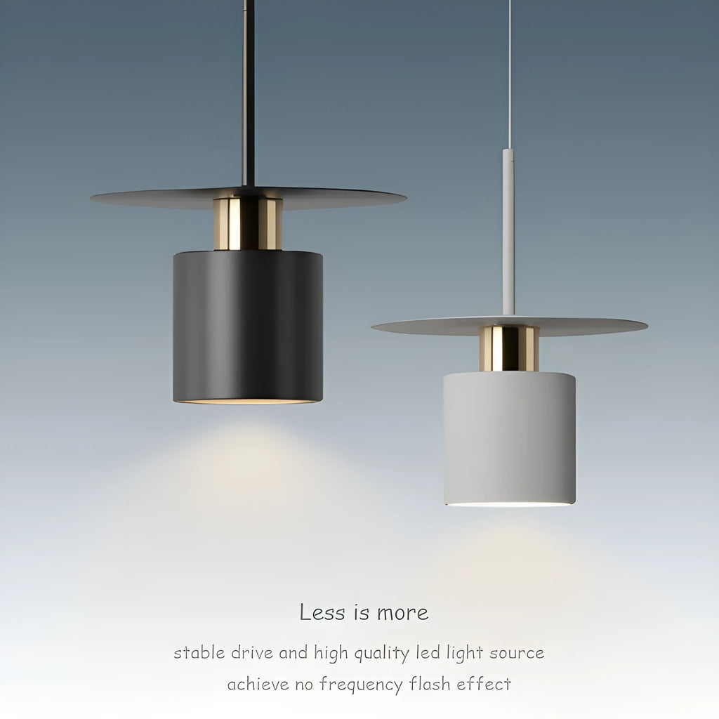 Modern minimalist black droplight pendant 20cm diameter on ceiling over a bedside table