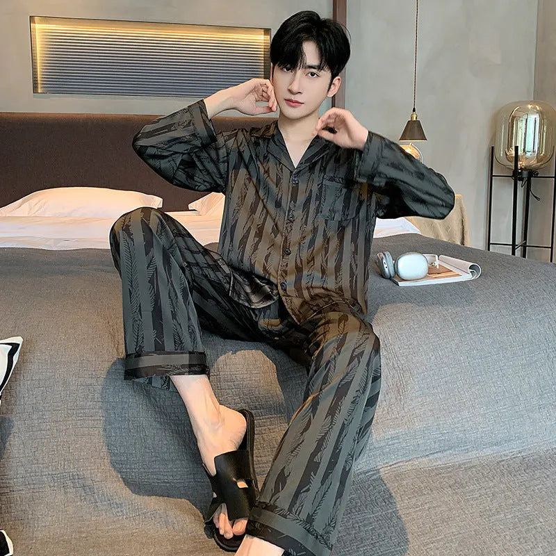 Men's black striped ice silk pajama set with V-neck top and elastic trousers