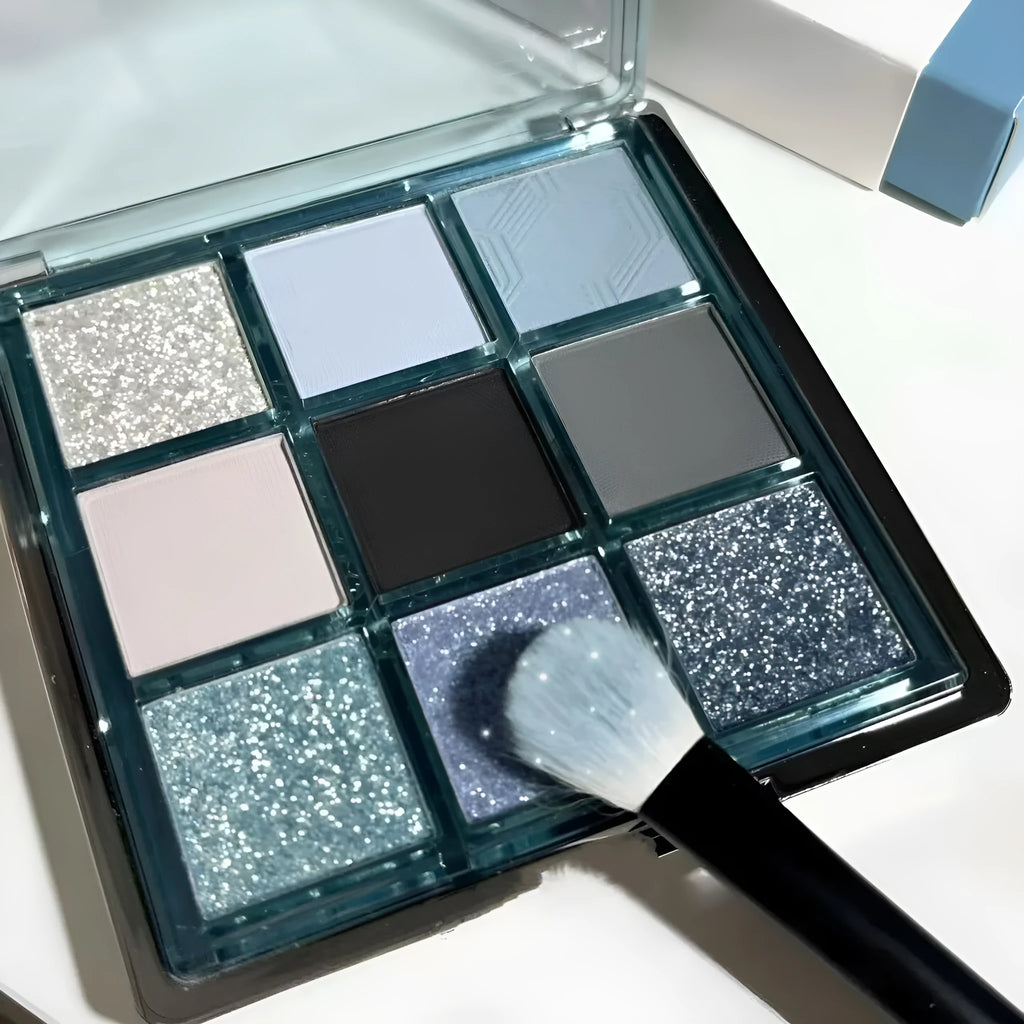 MUGELEEN nine-colour eye shadow palette showing blue smoked colours with matte and shimmer finishes