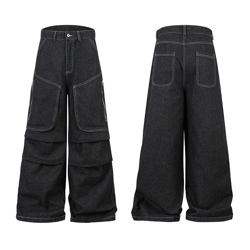 Black pleated denim jeans with multiple pockets, shown on a hanger.