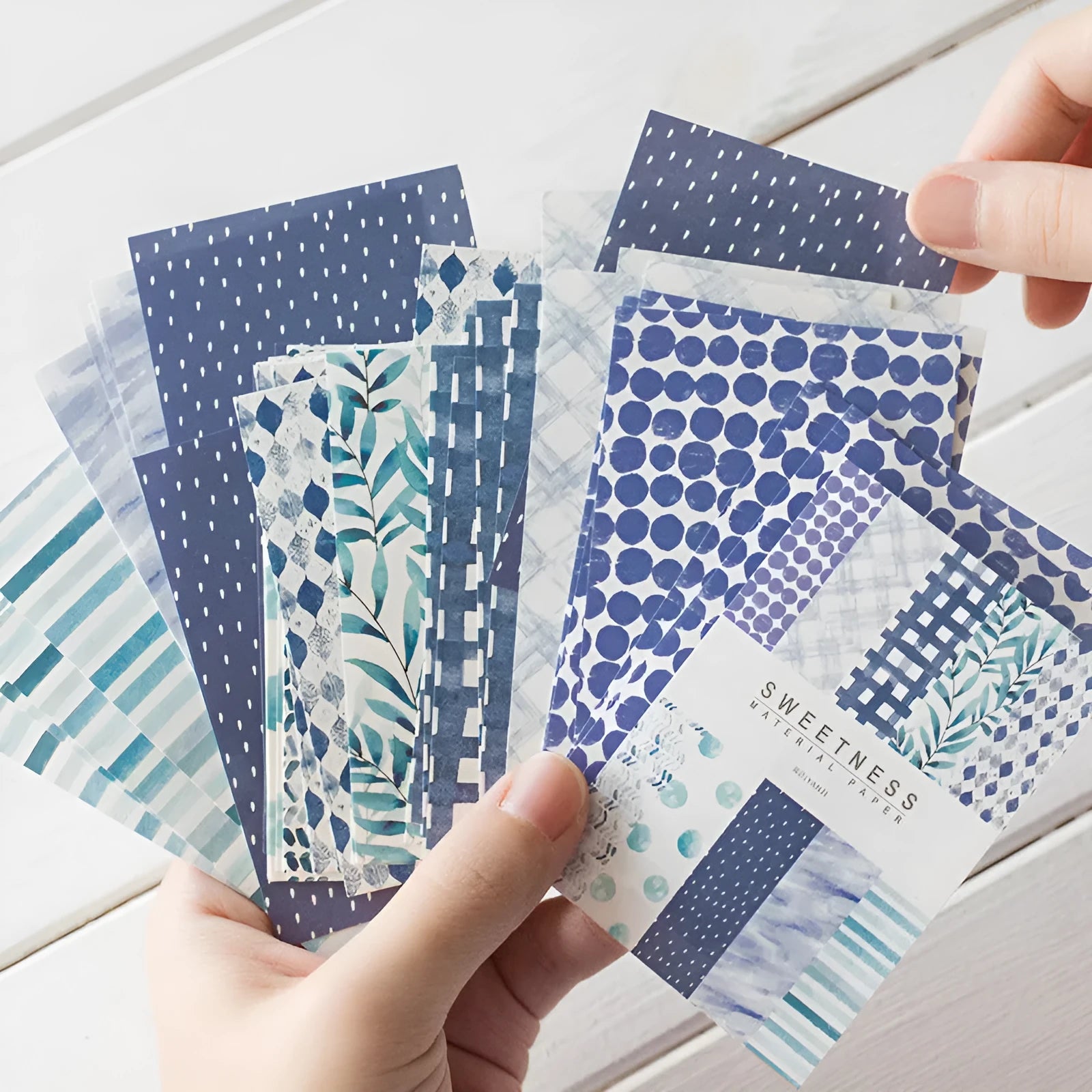 Fifty sheets of dessert-themed retro collage note paper in ten colours including strawberry and blueberry.