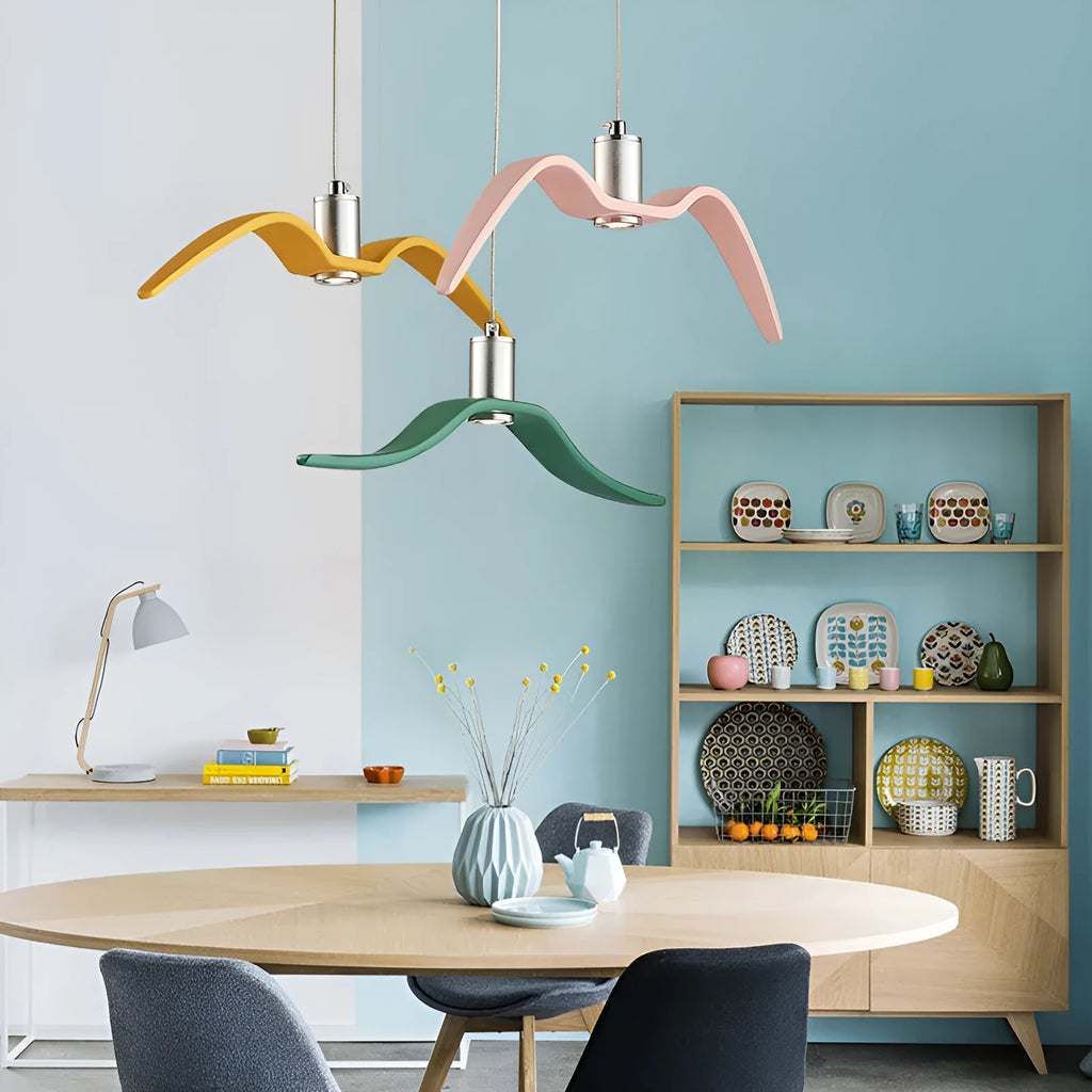 Nordic modern macaron-shaped LED chandelier light fitting in multiple colour options.