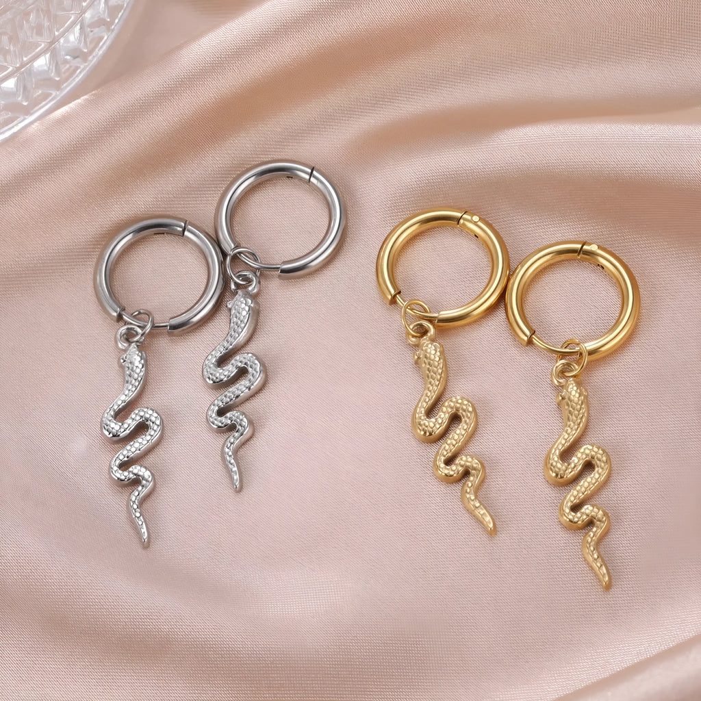 Snake-shaped vintage clip earrings in gold and steel colours