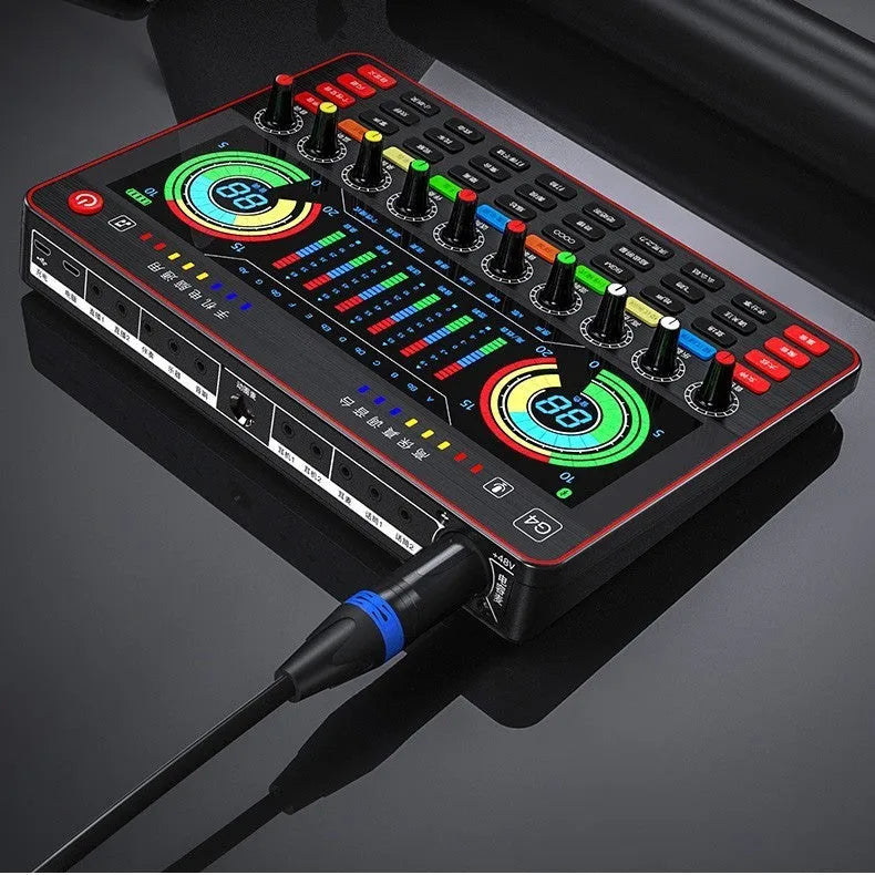 G4 professional sound card set with LCD screen, microphone, remote control, and cables on a desk.