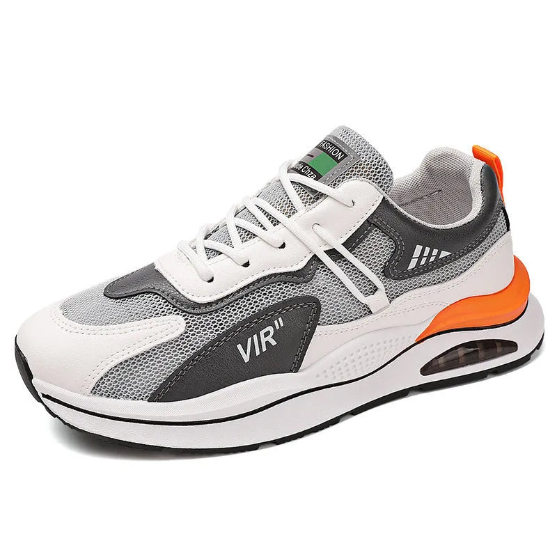 Men's grey mesh running shoes with round toe and middle top design on light background