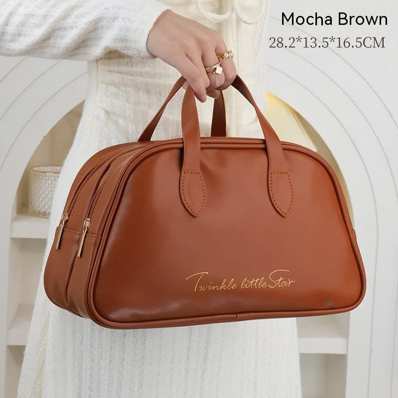 Leather travel toiletry bag in caramel mocha colour with dry wet separation compartments