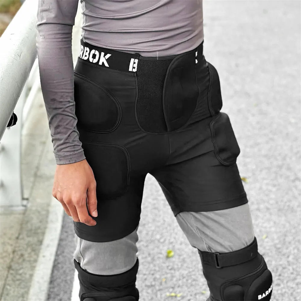 Black protective hip pad made of spandex and NBR foam for skating and skiing safety.