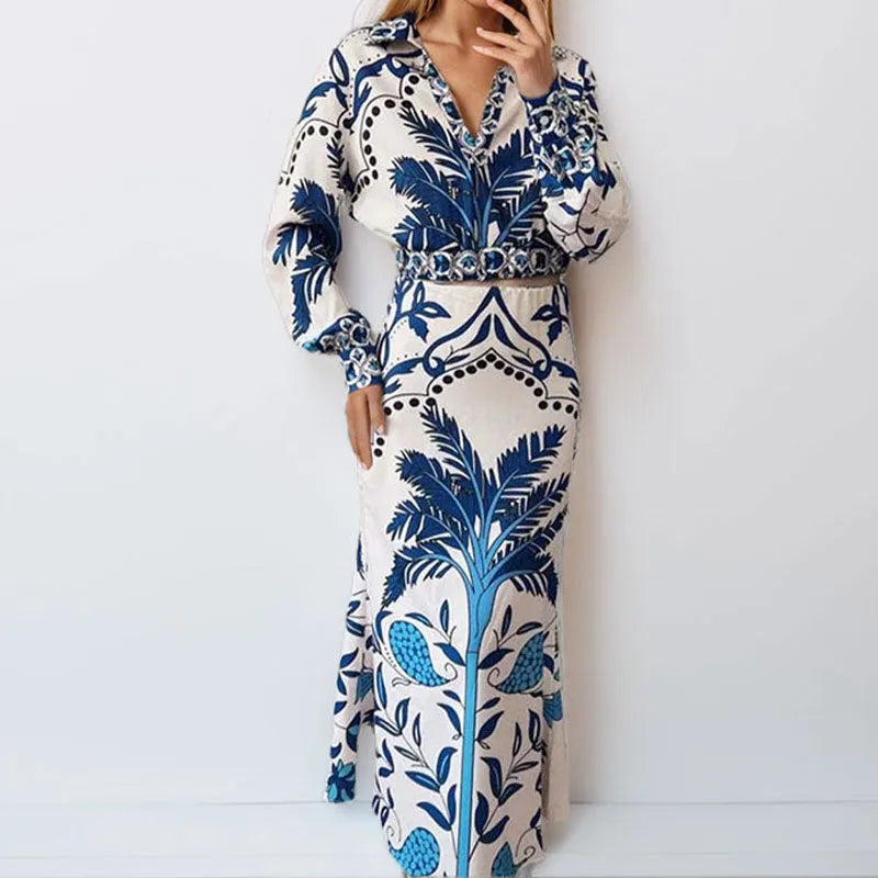 Women's floral print casual co-ord set with long sleeve top and long skirt on a hanger.