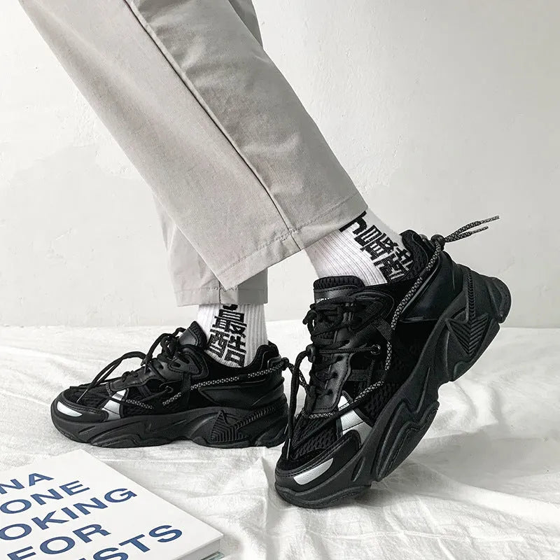 Men's white platform dad shoes in Korean style with front lace-up and mesh lining.