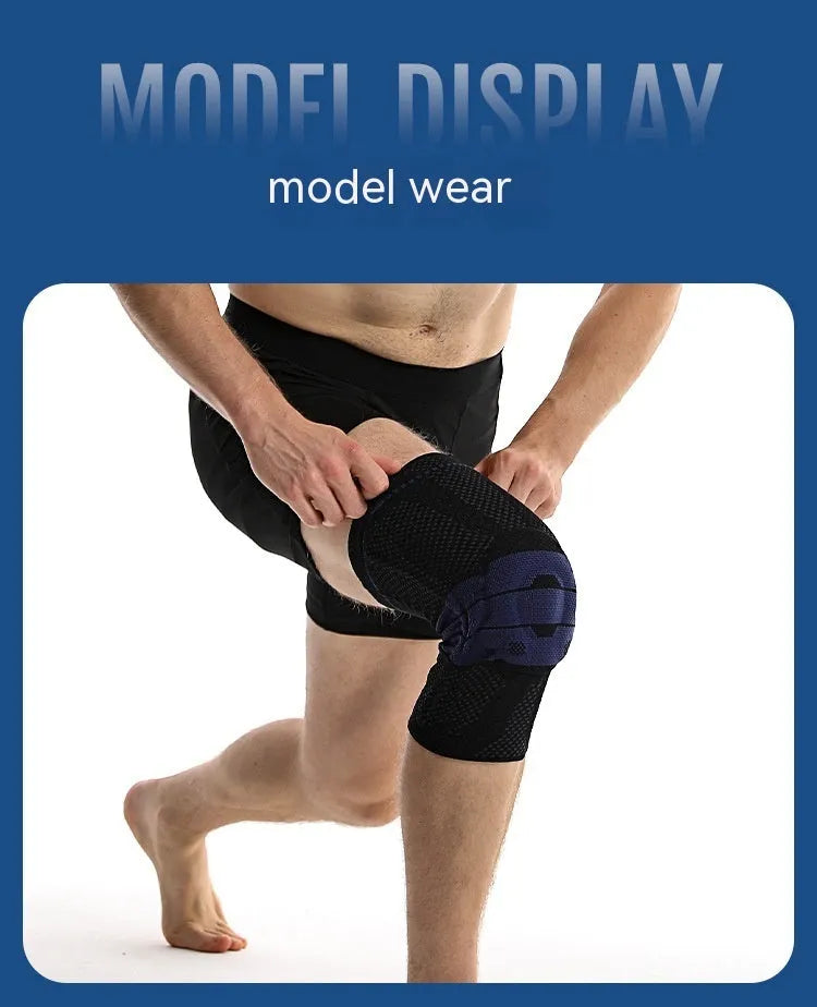 Adult sports knee pad in black and blue colour, shown on a knee for running and basketball protection.