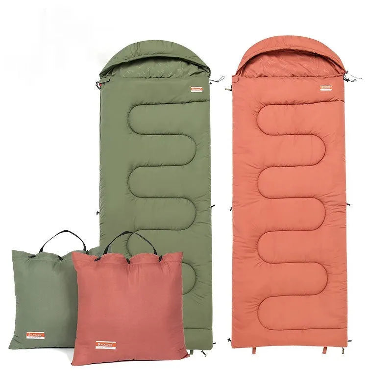 Ochre and olive green ultra-light cotton camping sleeping bag laid out flat.