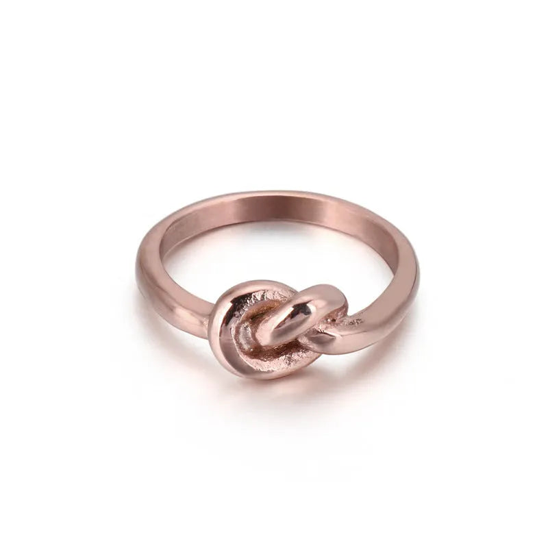 Truelove knot geometric titanium steel ring in gold KR82086-K on white background