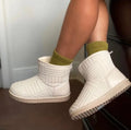 Winter ankle boots with cotton upper, flat plastic sole, round toe, mid-upper height, available in four colours.