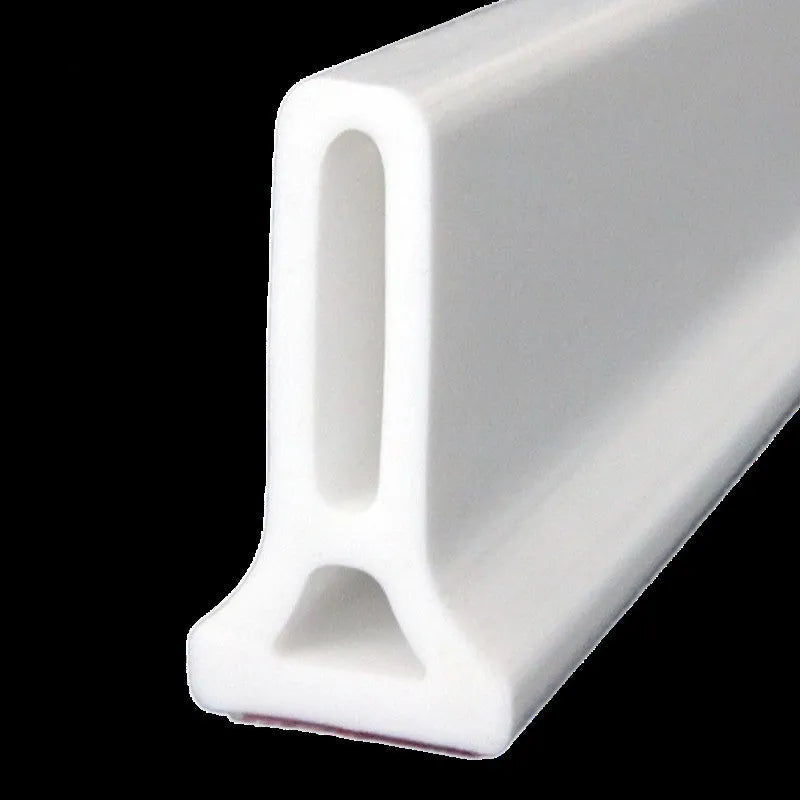 Flexible black TPE silicone water blocking strip for bathroom shower floor.