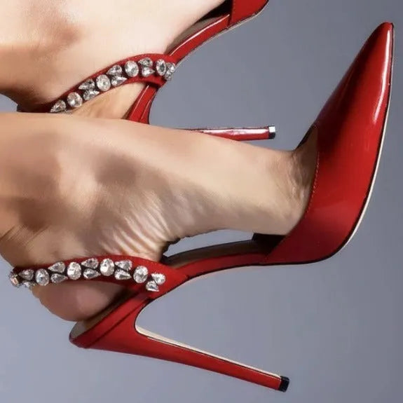 Women's black patent leather pointed toe high heel sandals with rhinestone side detail, shown on a white background.
