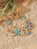 Alloy marine charm bracelet with shell, starfish, and anchor design in turquoise, red, or blue.