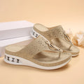 Women's air cushion wedge thong sandals with hollow metal buckle, black PU upper, rubber sole, herringbone toe