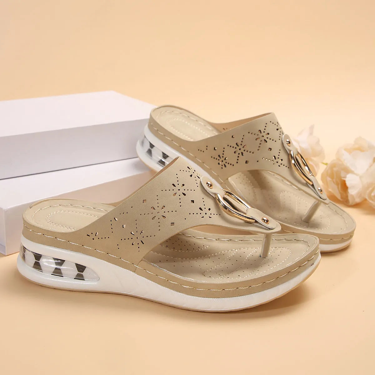 Women's air cushion wedge thong sandals with hollow metal buckle, black PU upper, rubber sole, herringbone toe