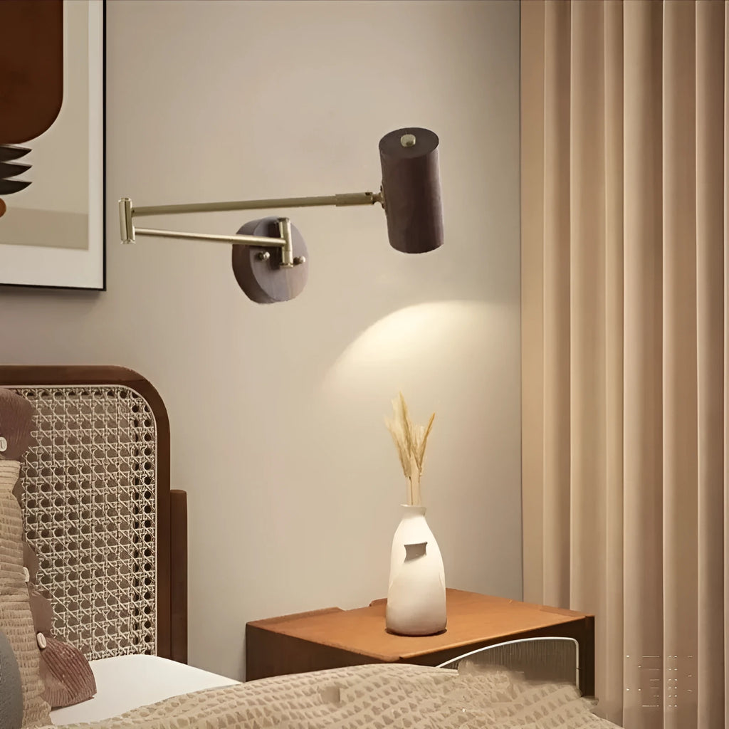Retro wooden wall lamp with rotating spot light head and long arm, showing cord with built-in switch.