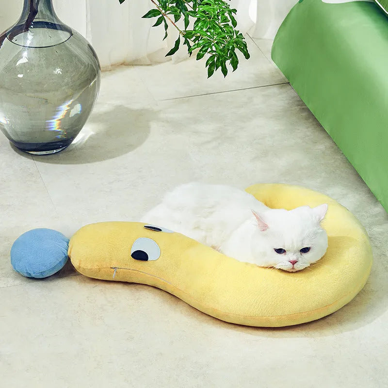 Blue or yellow pet sleeping cushion measuring 62 by 39 centimetres for cats and dogs