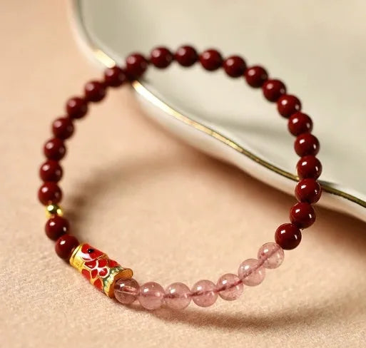 Hand-woven unisex retro Koi bracelet with Purple Gold Sand, Strawberry Quartz, and crystal beads on display