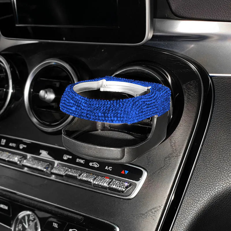 White diamond rhinestone car air vent cup holder bracket showing clip mechanism