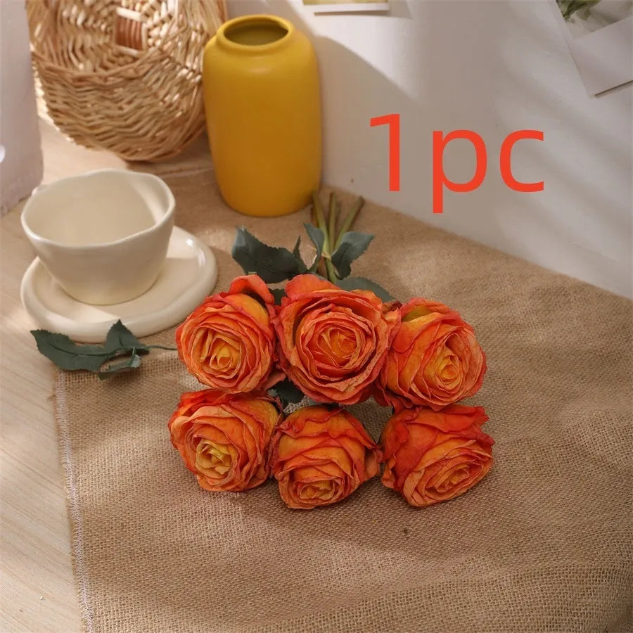 Single burnt edge simulated silk rose artificial flower with 38cm stem on neutral background