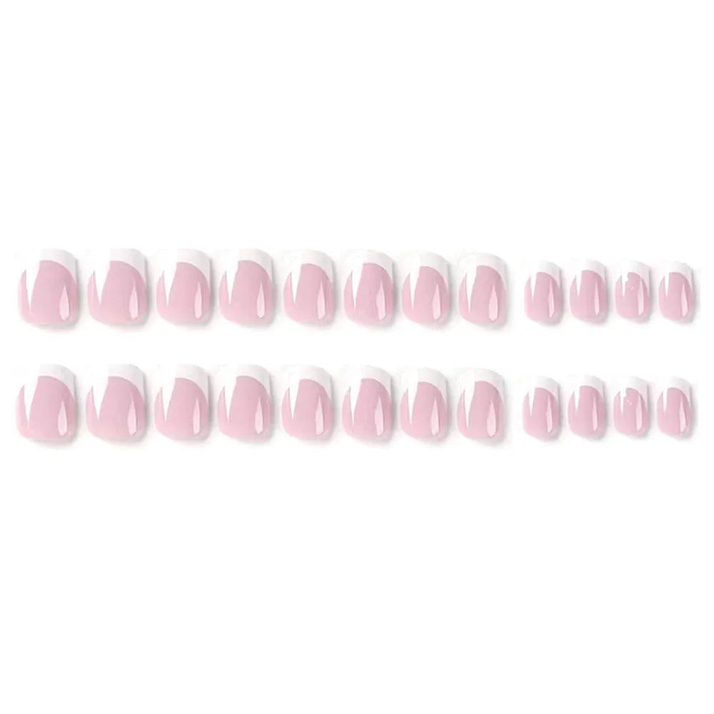 White fake nails with black and white plaid pattern, 24 pieces in an open box.