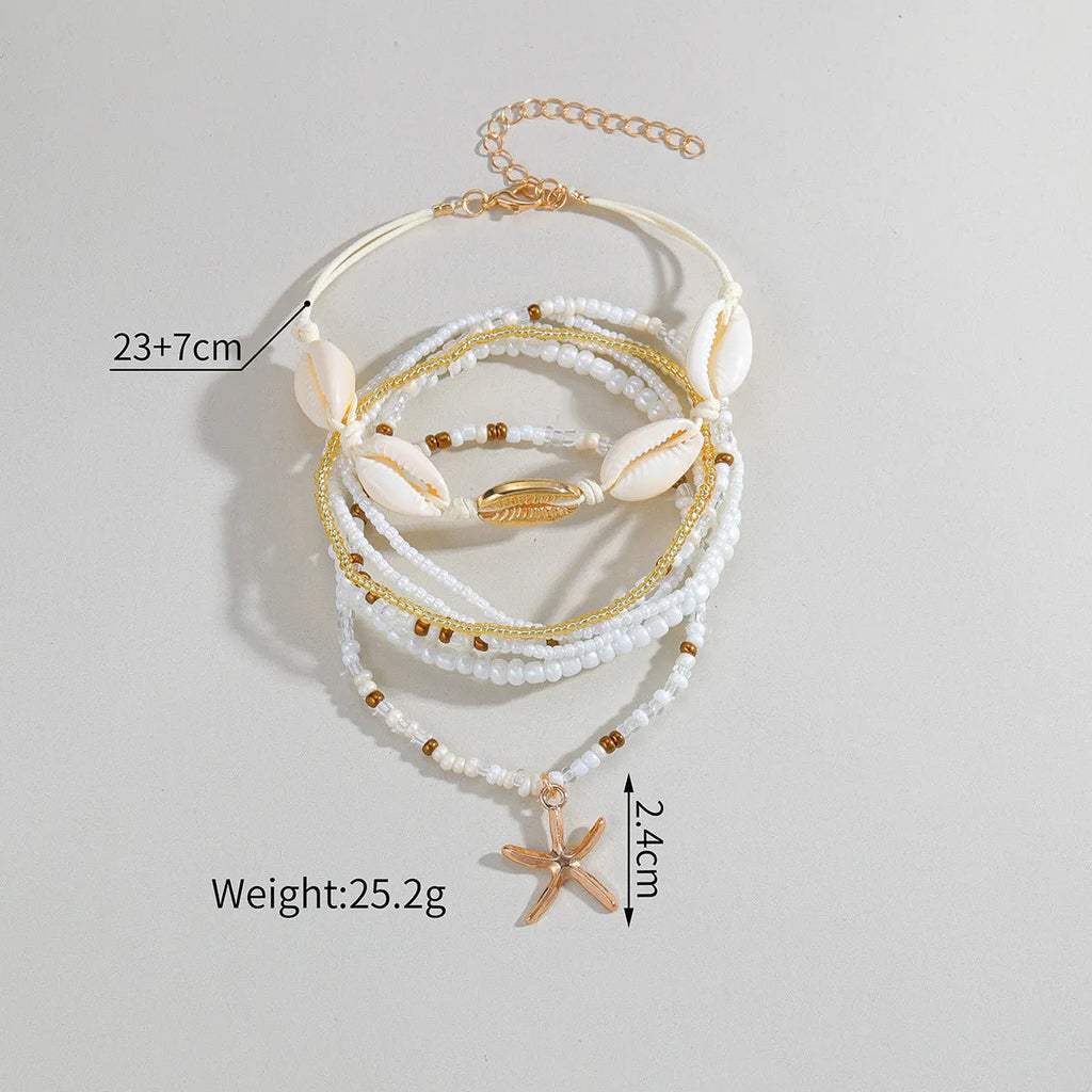Seven-piece women's anklet set with starfish pendant, shell and rice bead details on woven wax thread, colour XY-4358