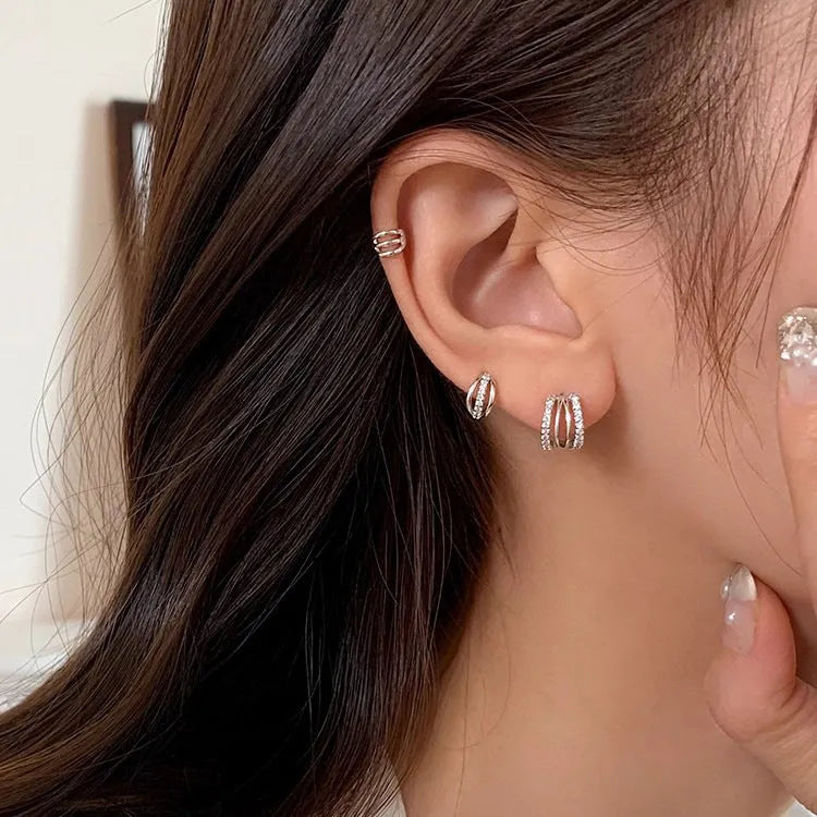925 silver geometric earrings in large, medium, and small sizes with electroplated finish