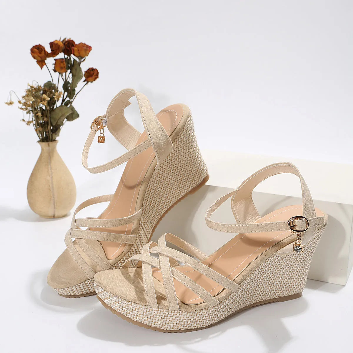 Women's beige fabric wedge sandals with fish mouth toe opening on wooden floor