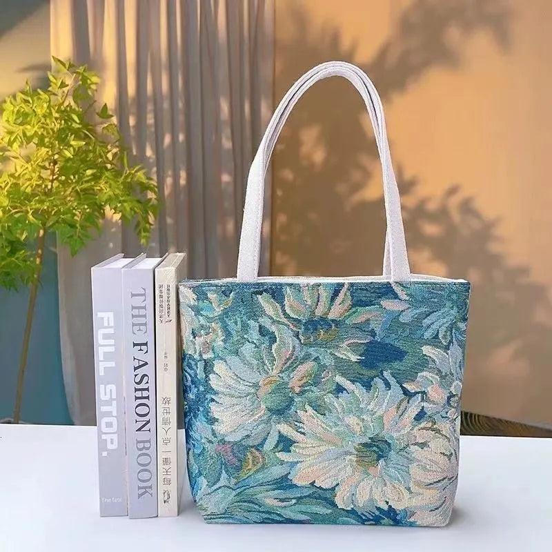 Double-sided gold wire embroidered handheld canvas tote bag in a choice of seven patterns and three sizes.