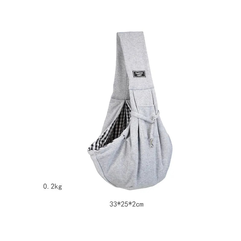 Large grey folding cat messenger backpack with mesh windows, shown on a person's back.